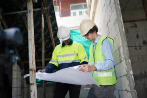 engineers reviewing blueprints at an urban constru 2026 03 18 07 07 33 utc